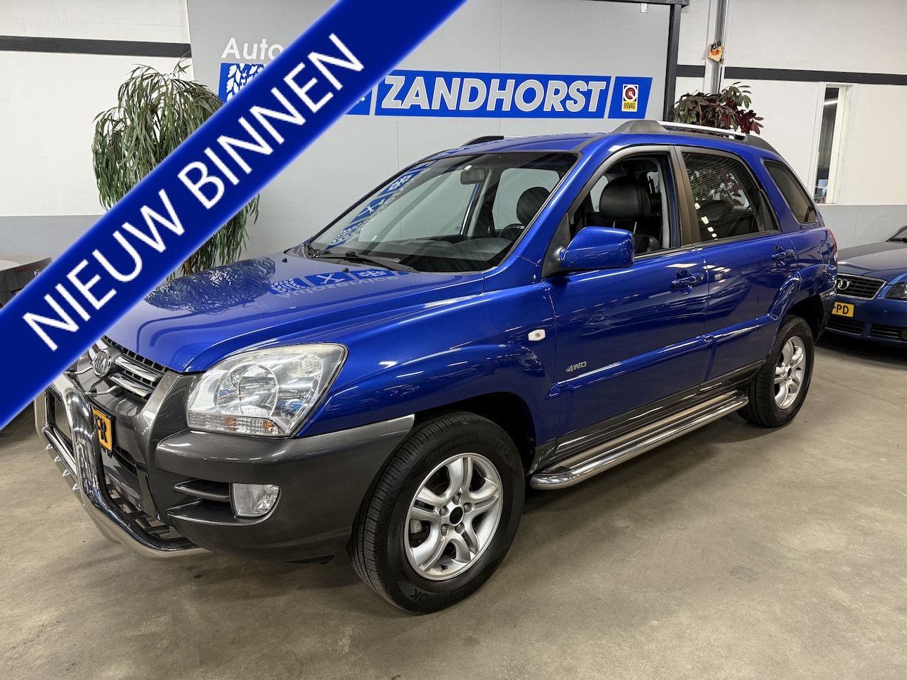 Kia Sportage - 2.0 CVVT Comfort 2.0 CVVT Comfort - AutoWereld.nl