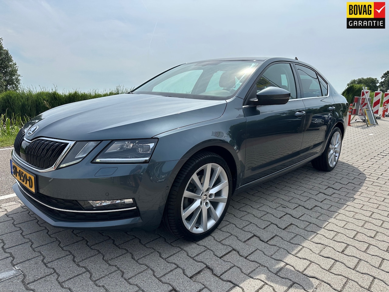 Skoda Octavia - 1.5 TSI Greentech Schuifdak, Carplay, PDC, Cruisecontrol, Xenon, Leder - AutoWereld.nl