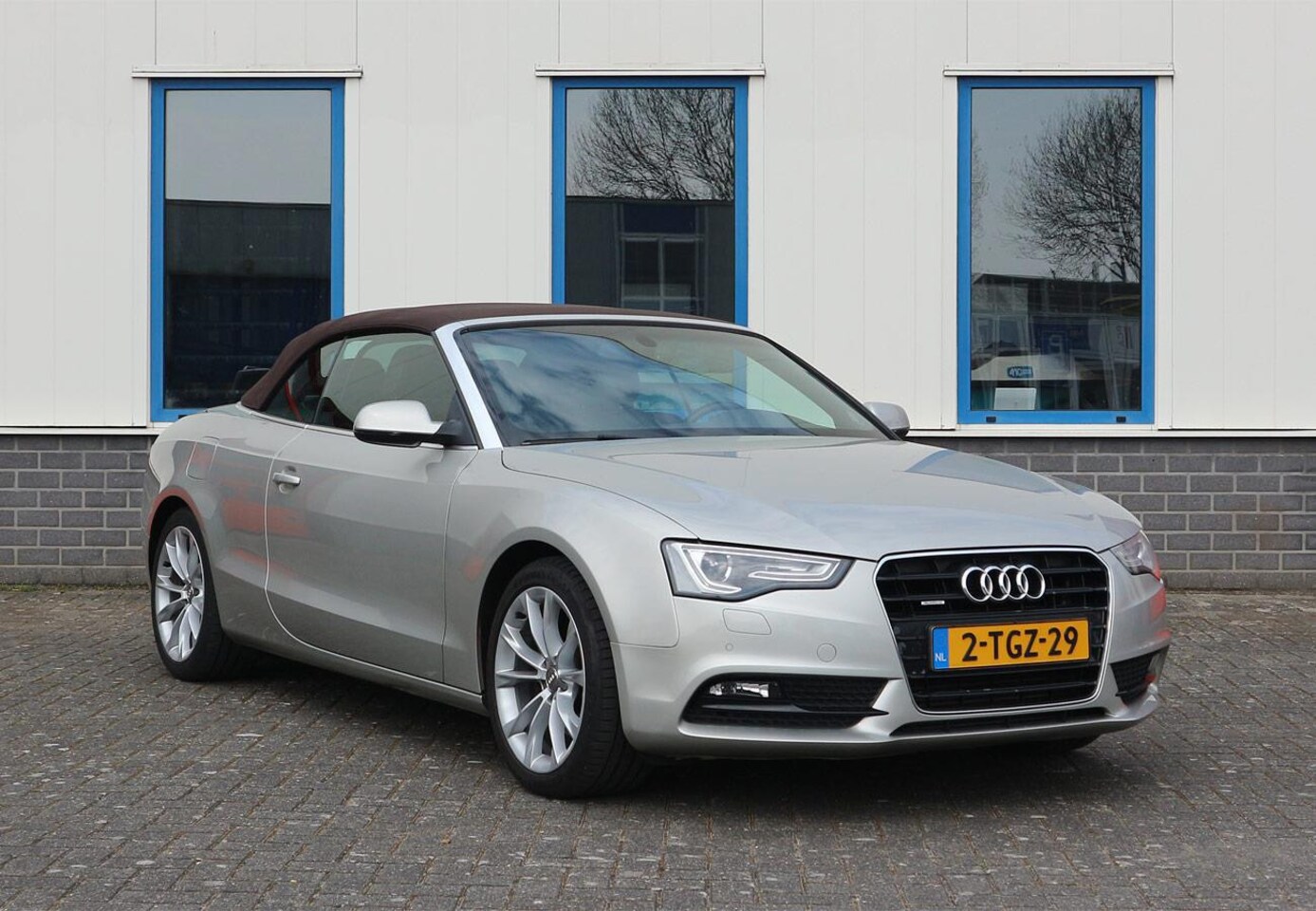 Audi A5 Cabriolet - 2.0 TFSI quattro S-tronic VOL Cuvée zilver - AutoWereld.nl