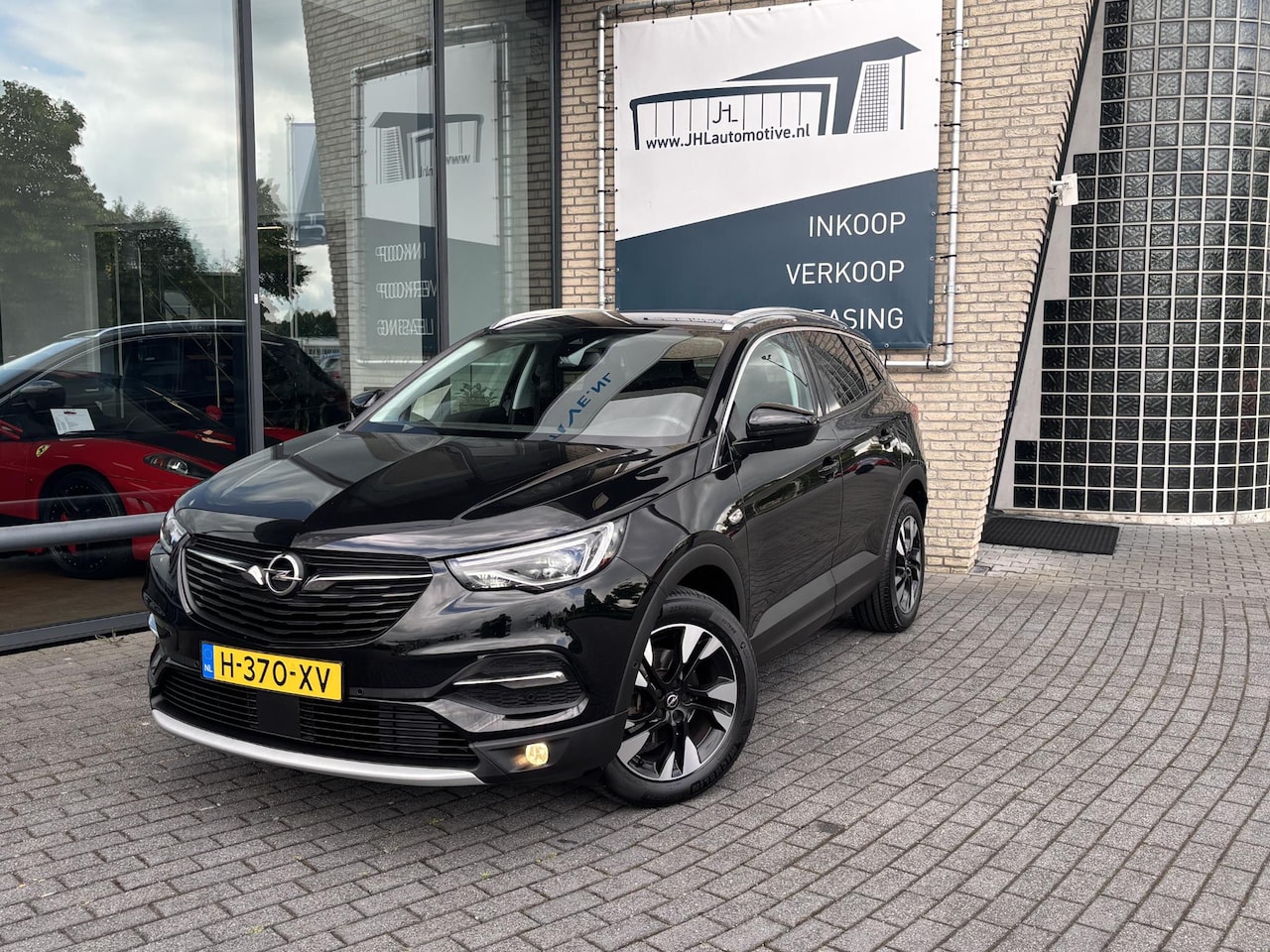 Opel Grandland X - 1.2 Turbo Business Executive*AUTOM*NAVI*CRUISE*ECC - AutoWereld.nl