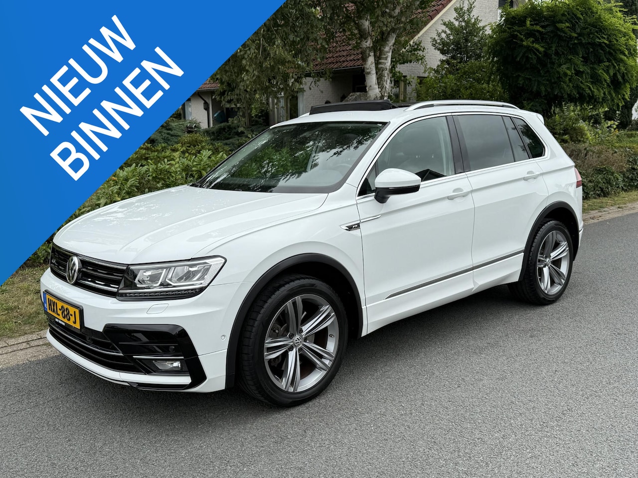 Volkswagen Tiguan - 2.0 TSI 4Motion 180PK DSG R-Line•Pano•Trekhaak - AutoWereld.nl