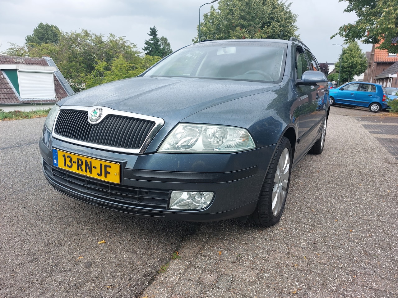 Skoda Octavia Combi - 2.0 FSI Ambiente kombi met 6 bak - AutoWereld.nl