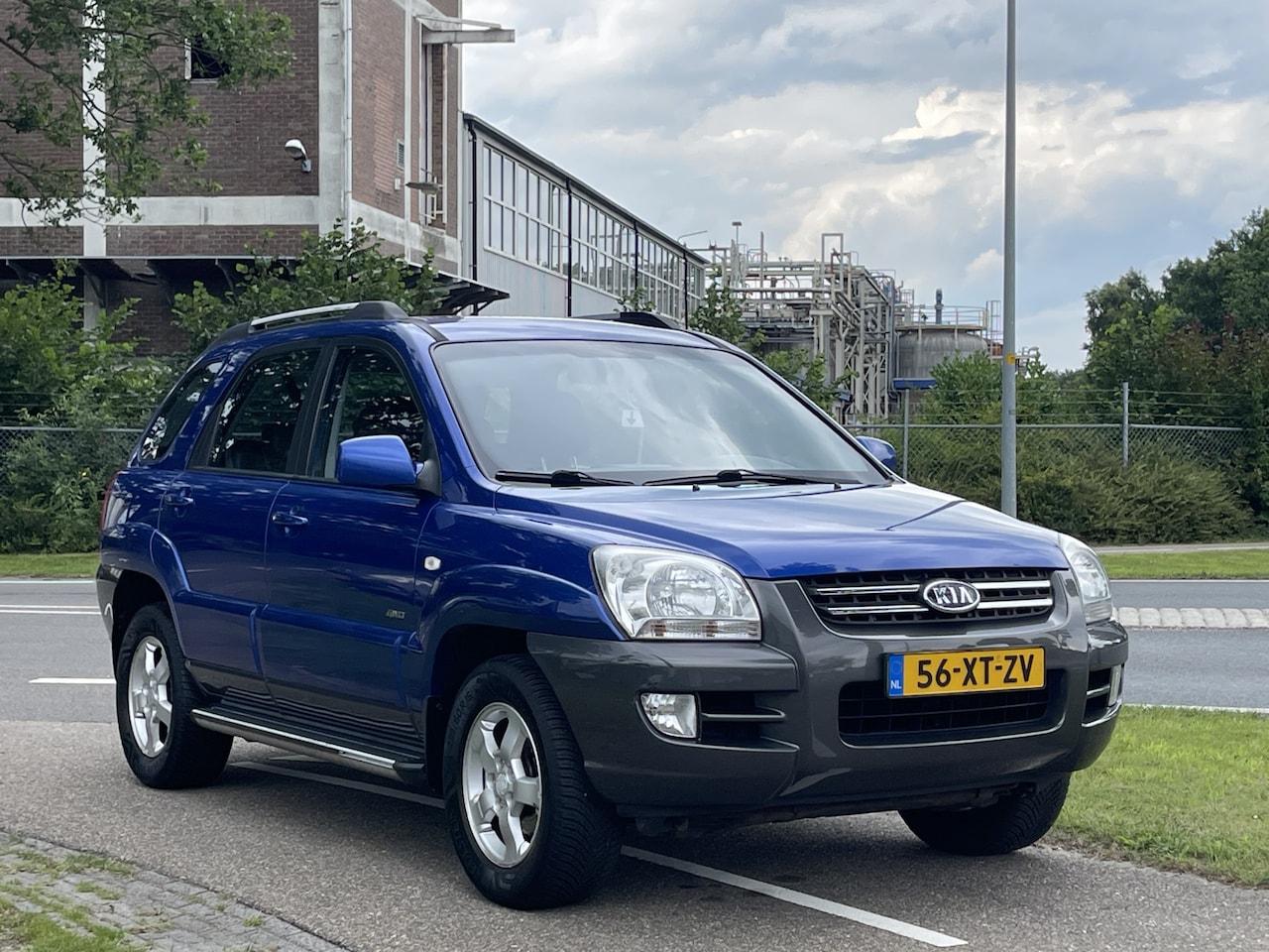 Kia Sportage - 2.7 V6 Adventure 4WD | Lederen Bekleding | Trekhaak | APK 5-2026 | Navigatie - AutoWereld.nl