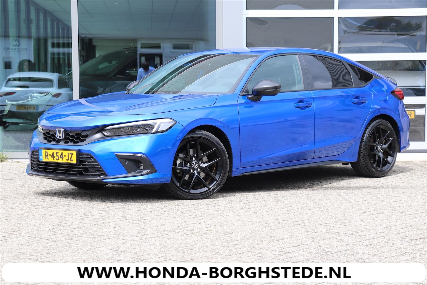 Honda Civic - 2.0 HYBRID Sport - Carbon Pack - AutoWereld.nl