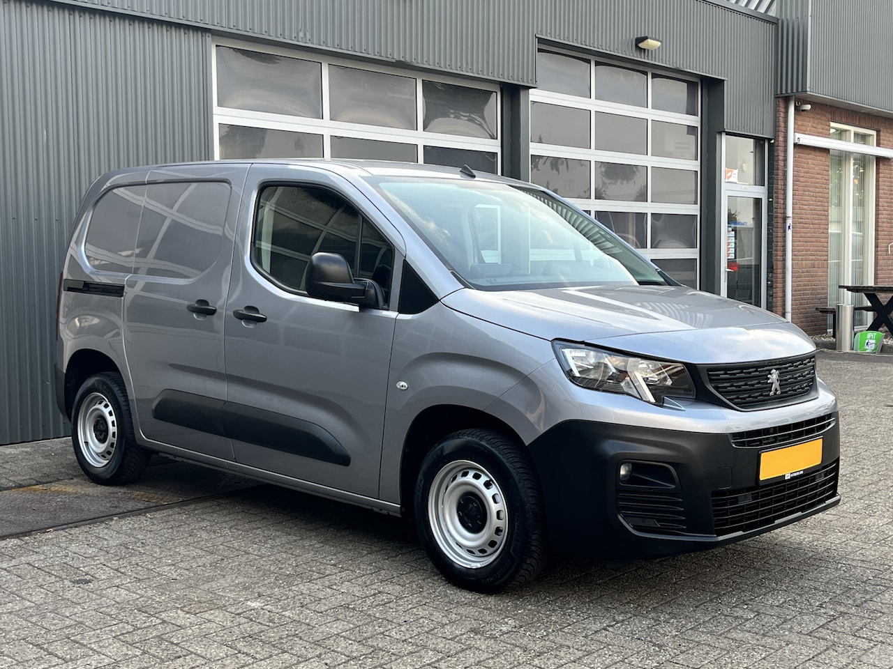 Peugeot Partner - 1.5 HDI BTW VRIJ Airco Schuifdeur Cruise controle Parkeerhulp achter Navigatiesysteem Deal - AutoWereld.nl