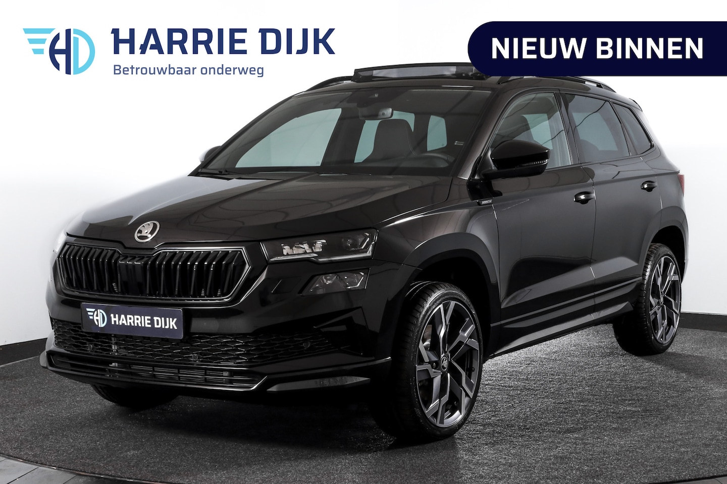 Skoda Karoq - 1.5 TSI 150 PK ACT Sportline Business - Automaat | S/K-Panodak | Columbus pakket | Dig. Co - AutoWereld.nl