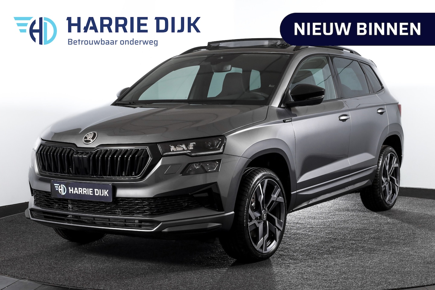 Skoda Karoq - 1.5 TSI 150 PK ACT Sportline Business - Automaat | S/K-Panodak | Columbus pakket | Dig. Co - AutoWereld.nl