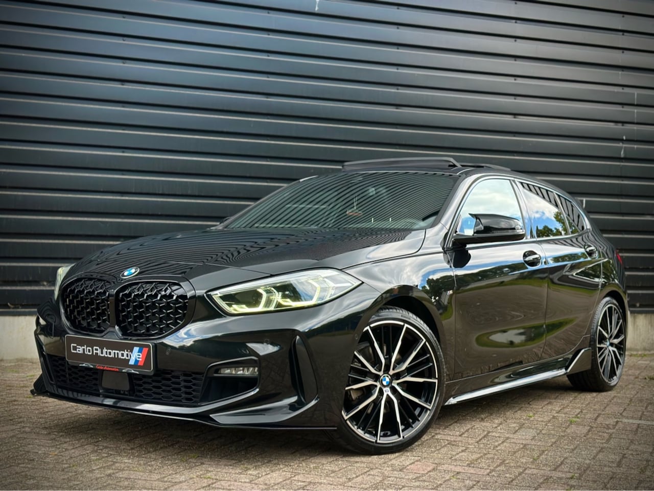 BMW 1-serie - 118i M135 M-PERFORMANCE PANO|H/K|CAMERA|LEDER - AutoWereld.nl