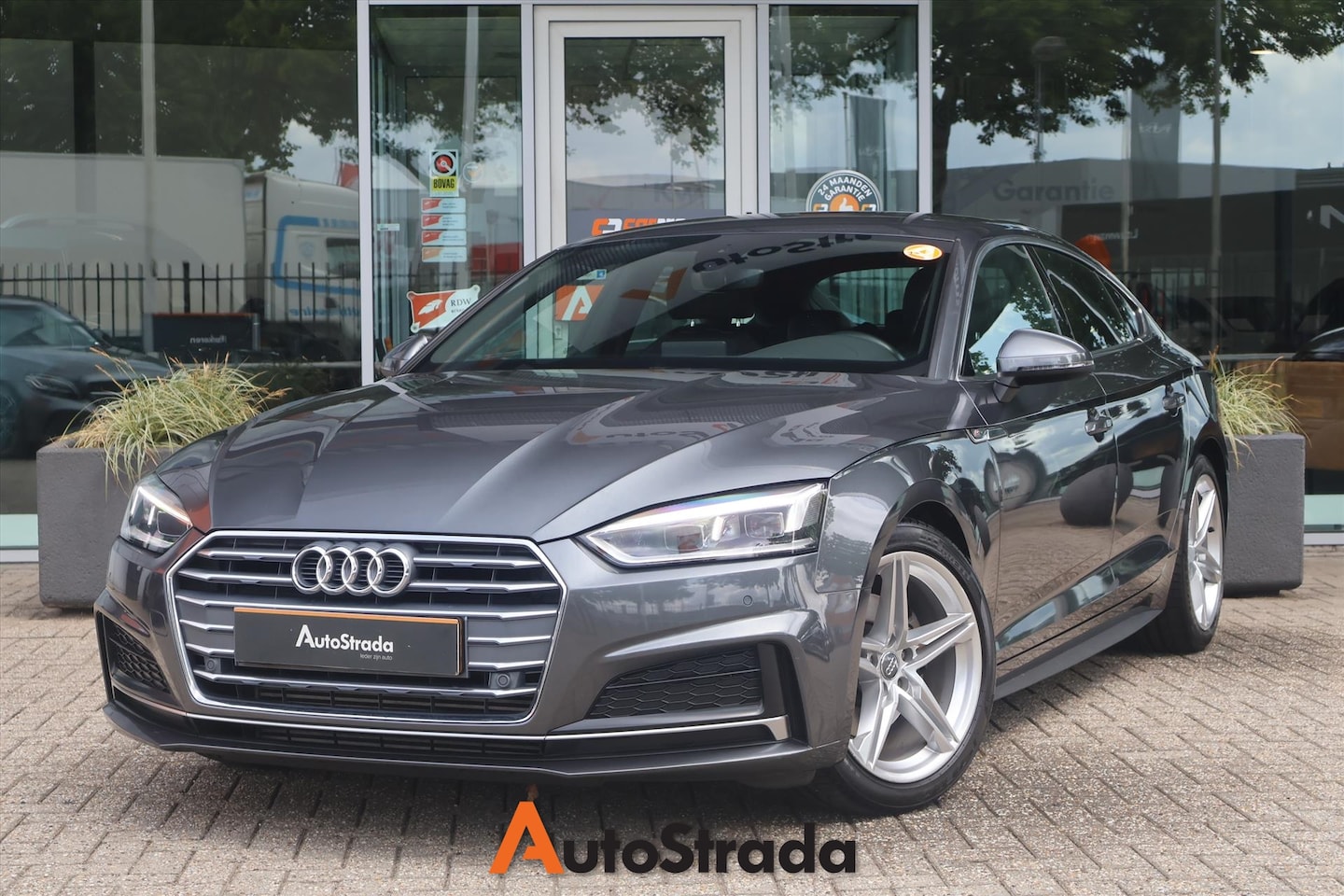 Audi A5 Sportback - 35 S-Line TFSI 150pk | LED | Climate | Cruise | Navi | Carplay | Bluetooth | Half Leder - AutoWereld.nl
