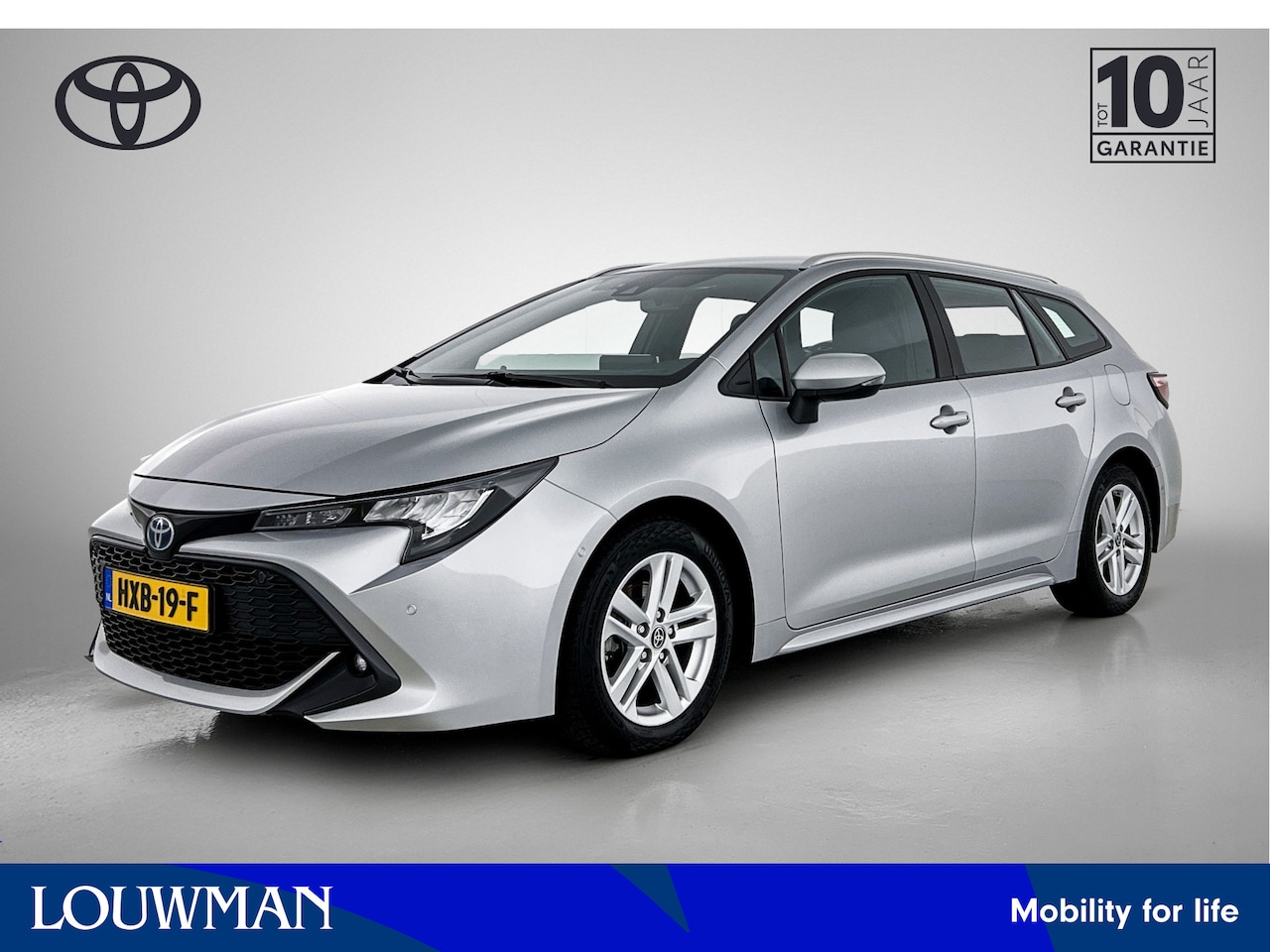 Toyota Corolla Touring Sports - 1.8 Hybrid Active Limited | Adaptive Cruise Control & Lane Assist | Camera | Climate Contr - AutoWereld.nl
