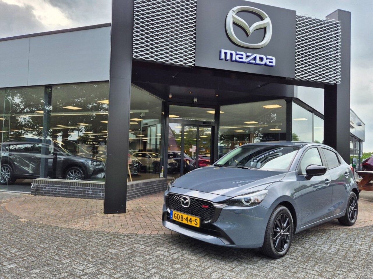 Mazda 2 Hybrid - E-SKYACTIV-G 90 6MT HOMURA M-HYBRID /Carplay / Trekhaak - AutoWereld.nl
