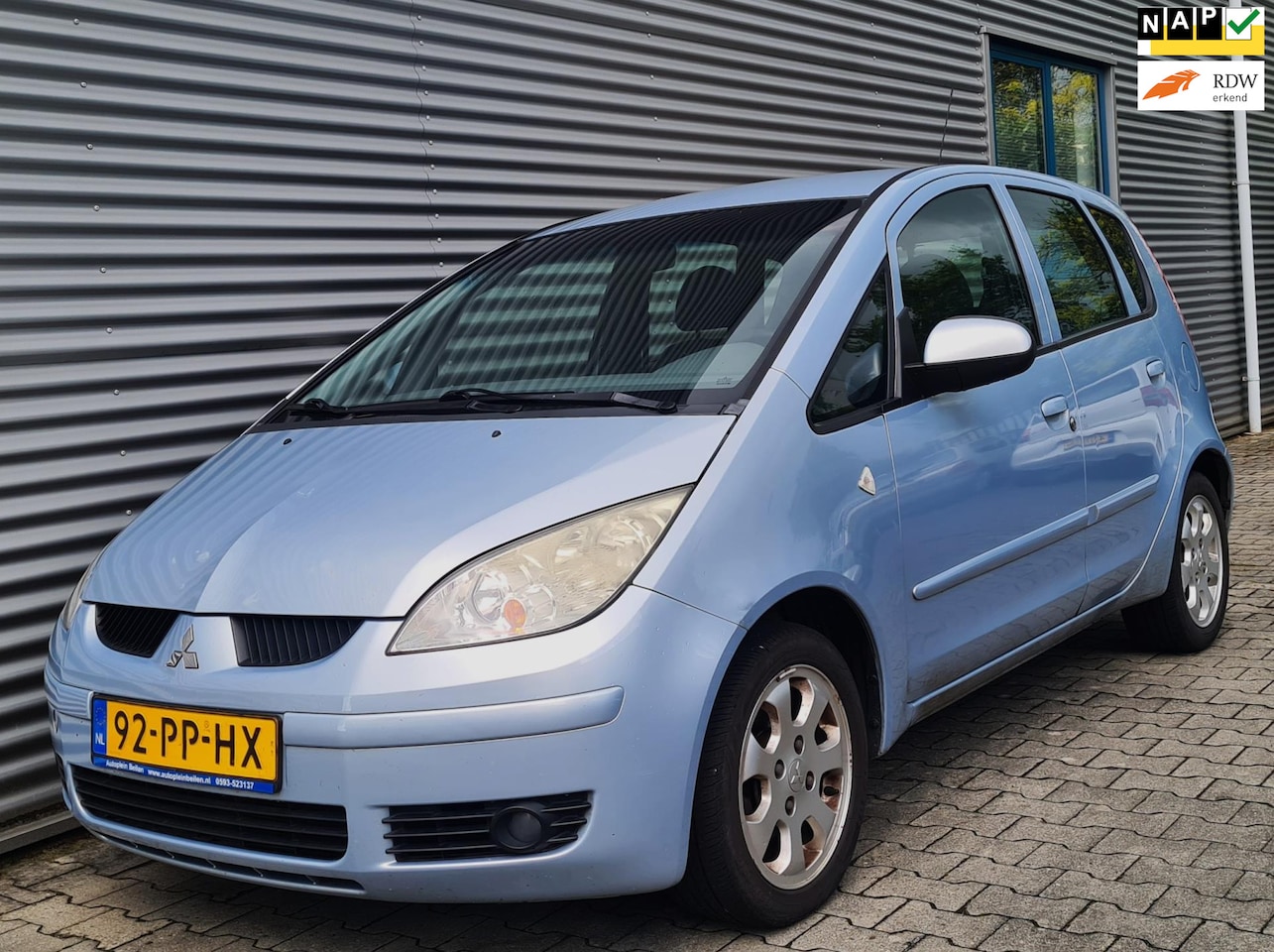 Mitsubishi Colt - 1.3 Inform Cool Pack Plus 5drs 09-2004 Blauw Metallic - AutoWereld.nl