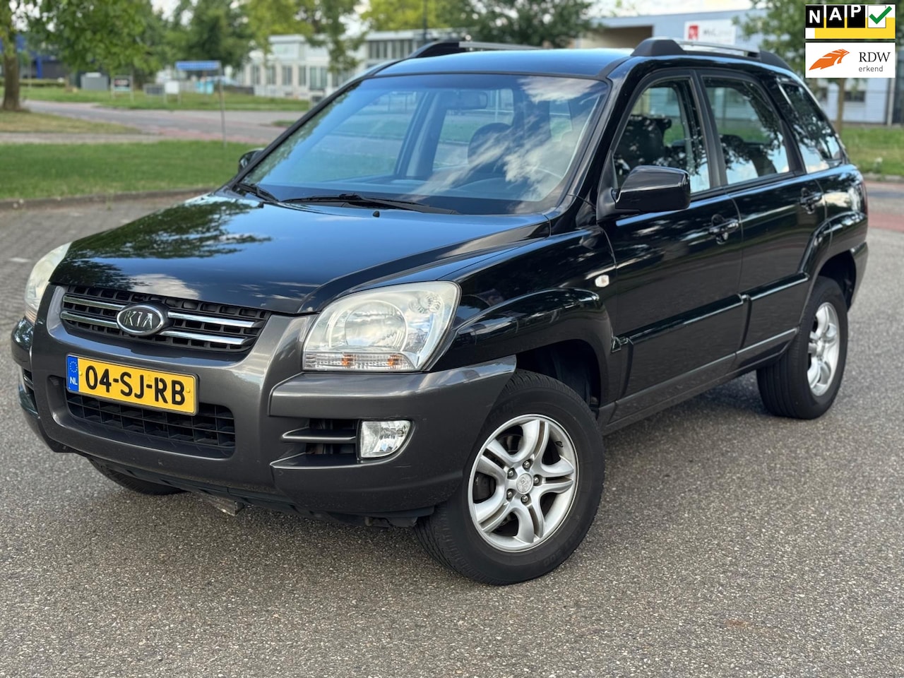 Kia Sportage - 2.0 CVVT Executive 2.0 CVVT Executive - AutoWereld.nl