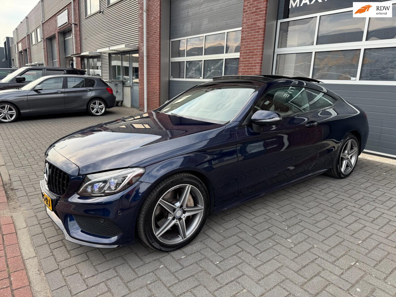 Mercedes-Benz C-klasse Coupé - C200 AMG Pano 360cam Burmester - AutoWereld.nl