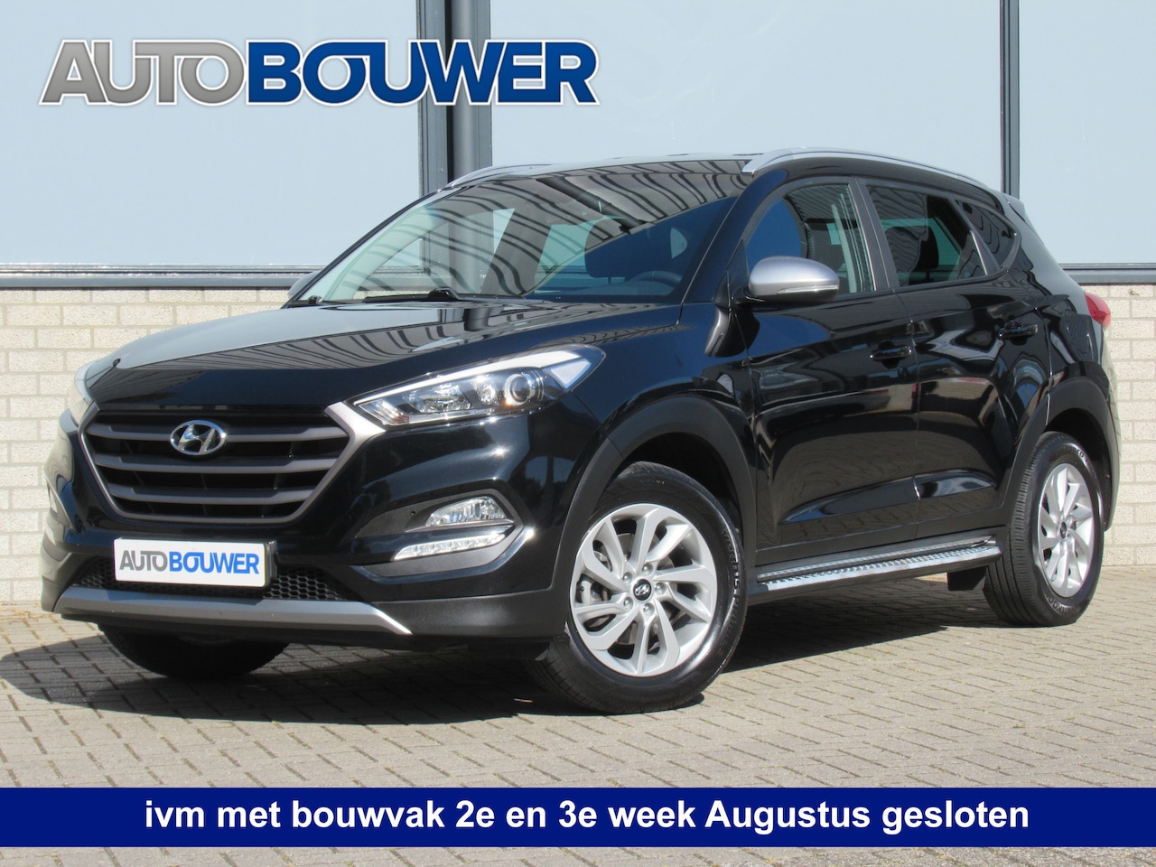 Hyundai Tucson - 1.6 GDi Go! 2e eigen | dealer onderh | sidesteps | navi | cruise | camera - AutoWereld.nl
