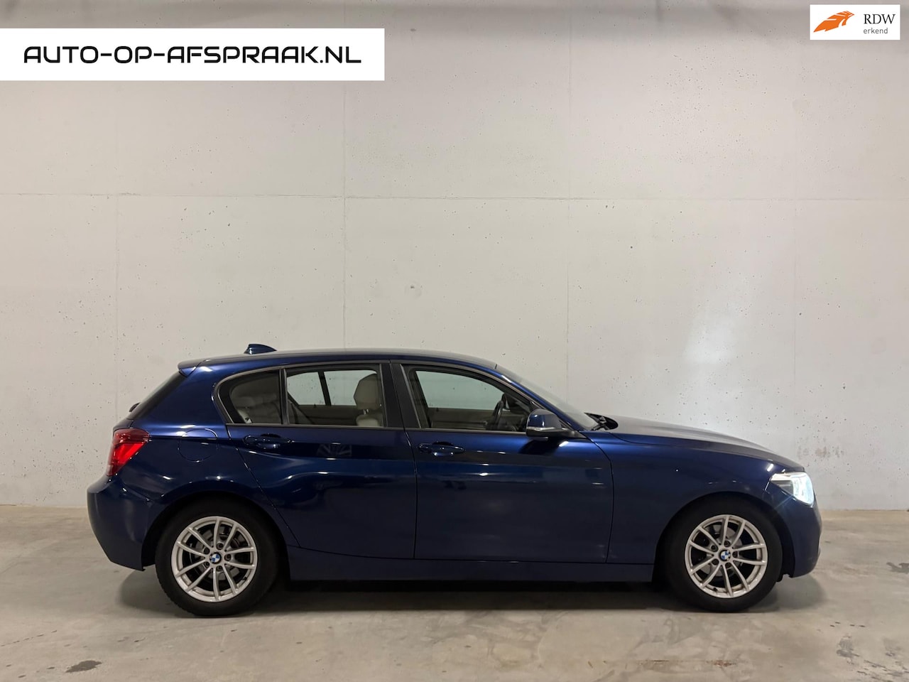 BMW 1-serie - 116i EDE High Executive Leer Navi Stoelverwarming - AutoWereld.nl