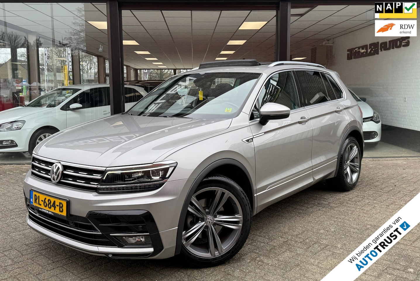 Volkswagen Tiguan - 1.4 TSI 1e EIG | R-LINE | PANORAMA DAK | VIRTUAL | NAP - AutoWereld.nl