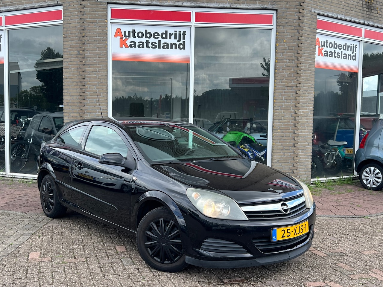Opel Astra GTC - 1.6 Enjoy - Cruise - Clima - - AutoWereld.nl