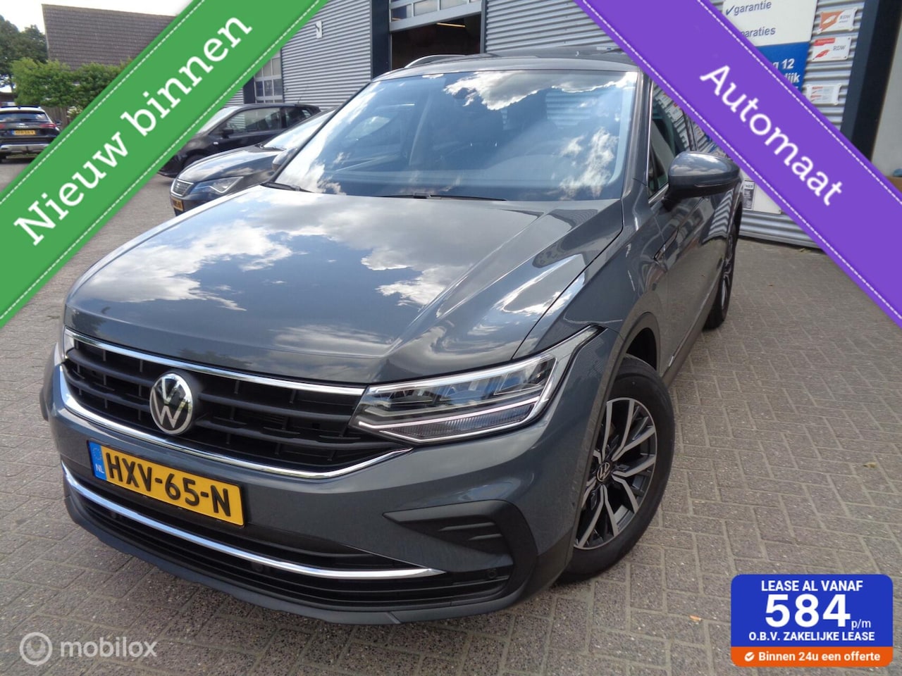 Volkswagen Tiguan - 1.5 TSI Elegance/Airco/Navi/Pano/Virtual/Leer/Memory/Stoel stuur verw/Trekhaak/Lm velgen/1 - AutoWereld.nl