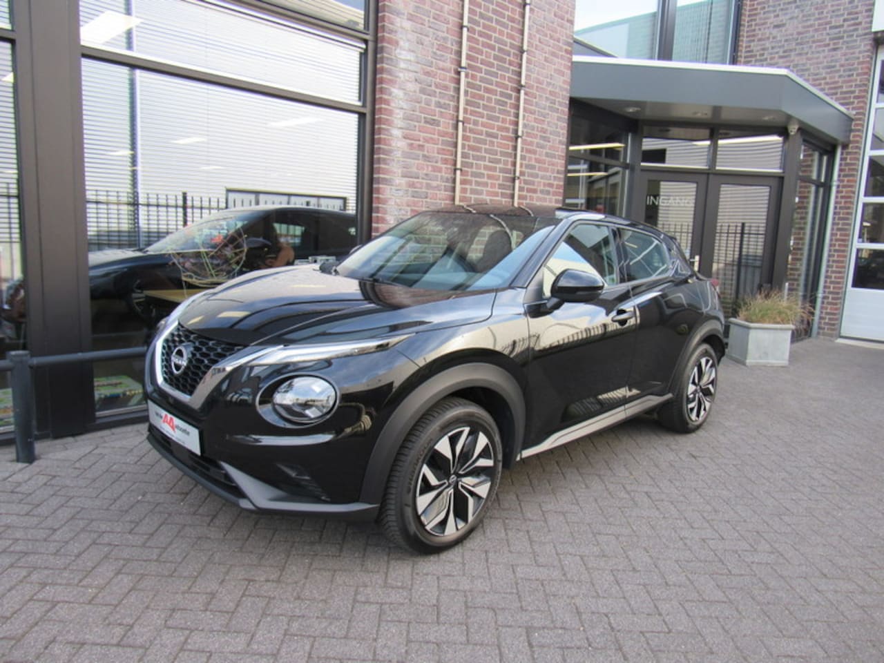 Nissan Juke - 1.0 DIG-T 114pk DCT Acenta / Navigatie / Achteruitrijcamera - AutoWereld.nl