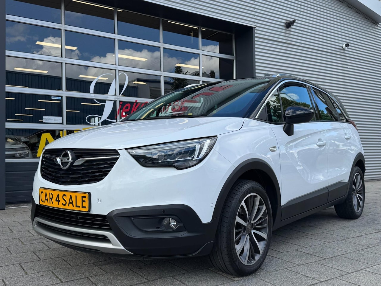 Opel Crossland X - 1.2 Turbo - Automaat I Panorama dak I 1/2 Leer I Navigatie I Airco I PDC/Camera I Sport ve - AutoWereld.nl