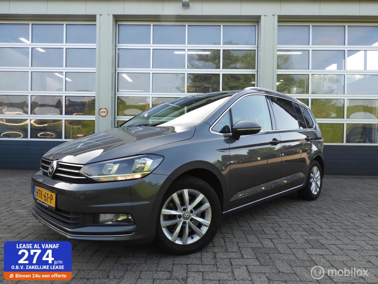 Volkswagen Touran - 1.6 TDI 7 persoons Highline - AutoWereld.nl