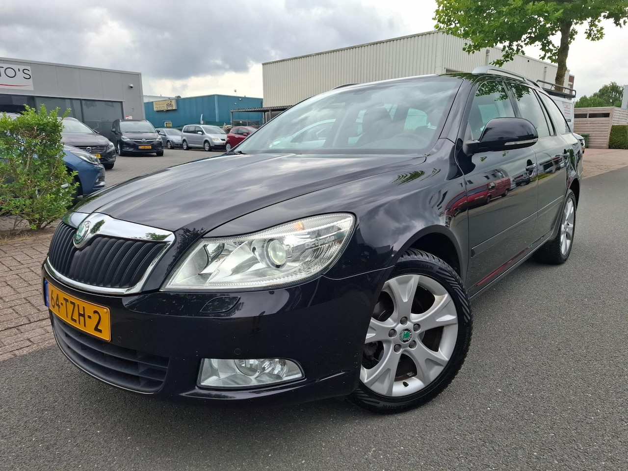 Skoda Octavia Combi - 1.4 TSI Elegance Business Line NAVI/XENON/TREKHAAK! - AutoWereld.nl