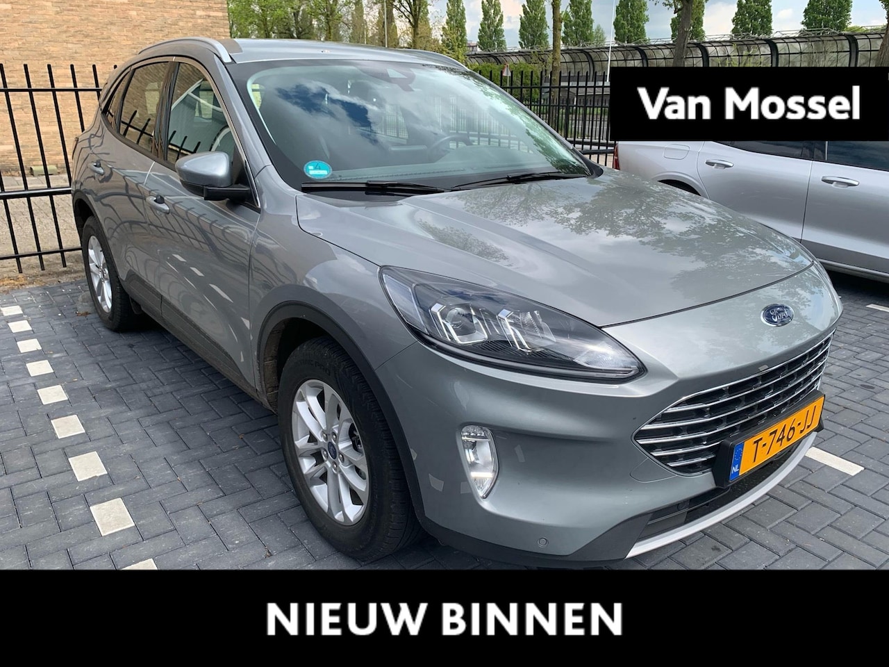 Ford Kuga - 2.5 PHEV Titanium Aut. | Trekhaak | LMV | Winterpack | Navigatie | Climate control | Cruis - AutoWereld.nl