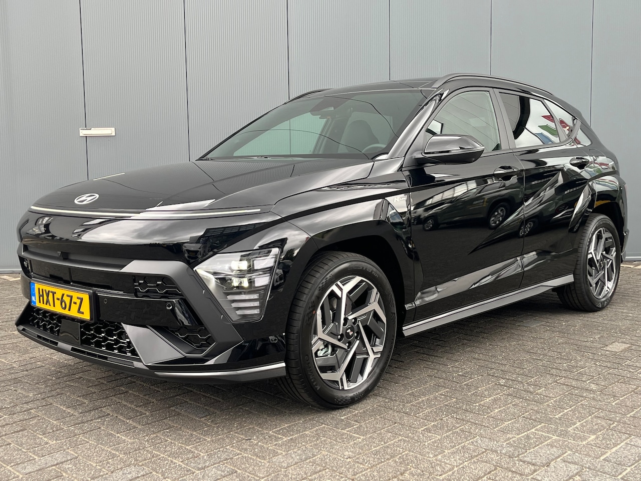 Hyundai Kona - 1.6 GDI HEV 130pk N-Line Sky Automaat | Carplay | Keyless | Climate | Navigatie | Full LED - AutoWereld.nl