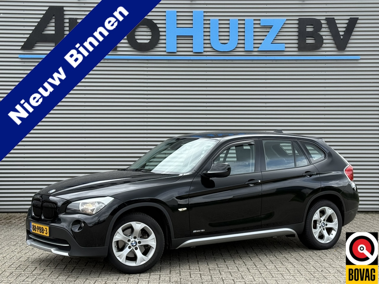 BMW X1 - sDrive18i Executive xLine Lederen interieur Trekhaak Climate control Navigatie PDC Cruise - AutoWereld.nl