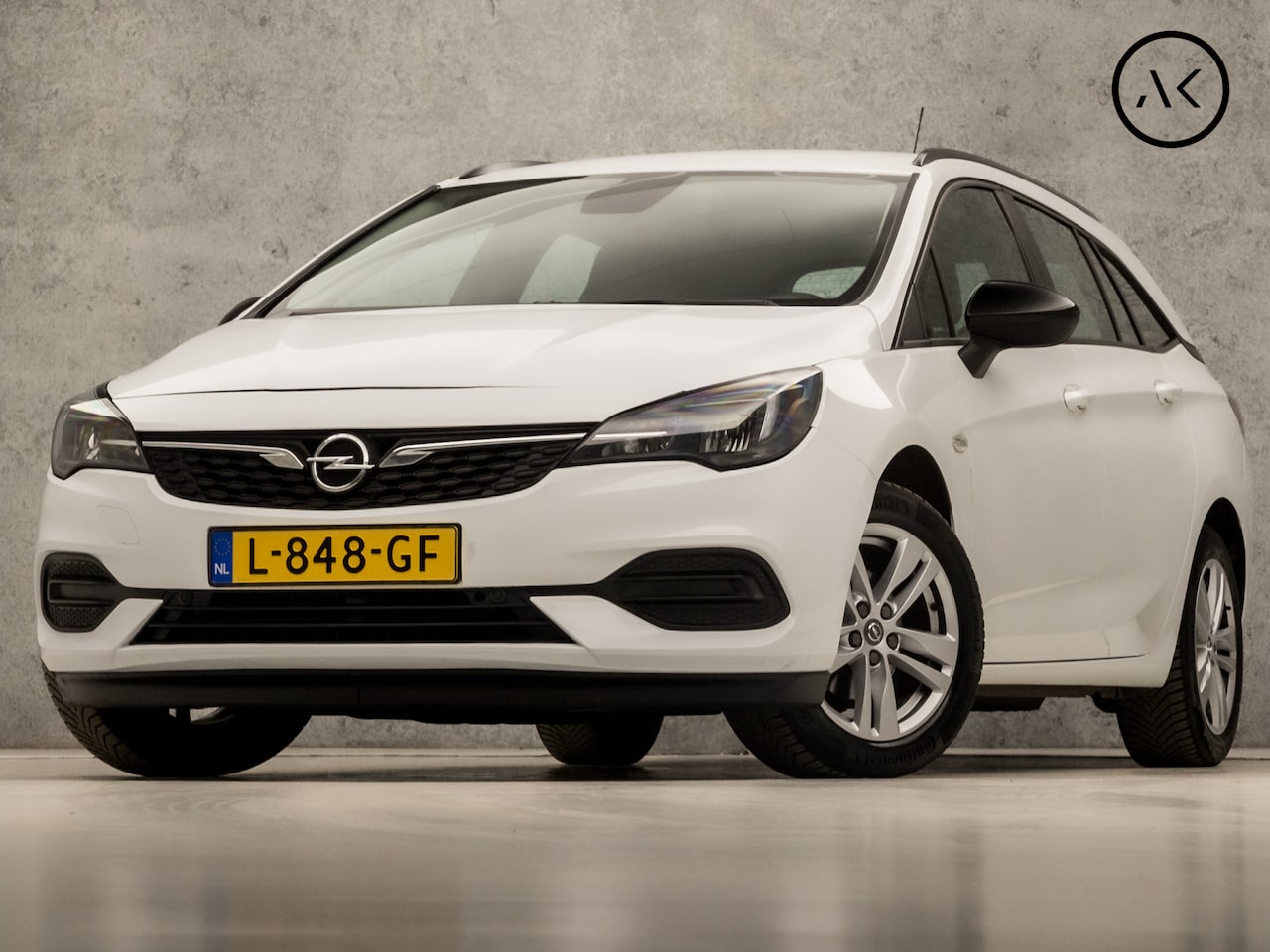 Opel Astra Sports Tourer - 1.2 Edition (APPLE CARPLAY, LM VELGEN, DAB+, SPORTSTOELEN, PARKEERSENSOREN, CRUISE, TREKHA - AutoWereld.nl