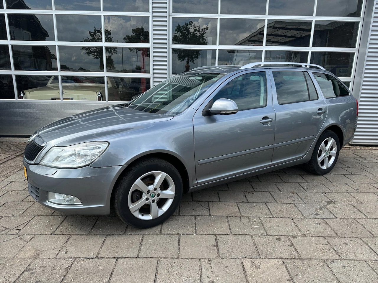 Skoda Octavia Combi - 1.4 TSI Greentech Elegance Business Line - Cruise Control - Airco - Start/Stop - Stuurwiel - AutoWereld.nl