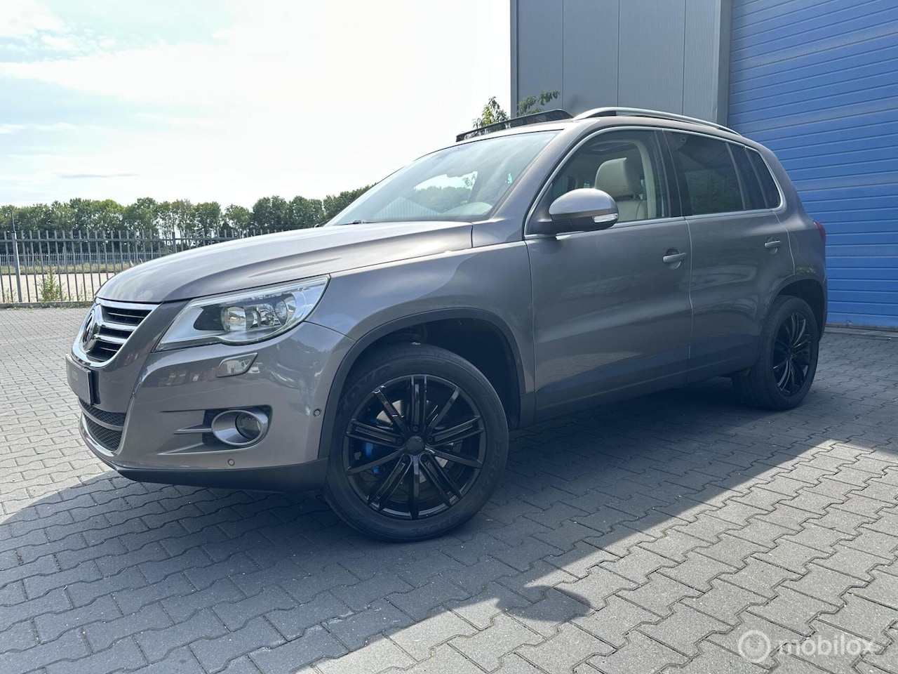 Volkswagen Tiguan - 2.0 TSI Track&Field 4Motion / Youngtimer / Camera / - AutoWereld.nl