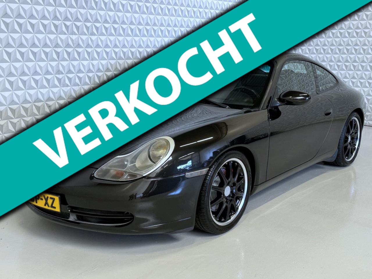 Porsche 911 - 3.4 Coupé Carrera mét historie! (1999) - AutoWereld.nl