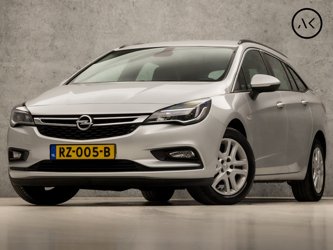 Opel Astra Sports Tourer - 1.0 Sport+ (APPLE CARPLAY, GROOT NAVI, CRUISE, SPORTSTOELEN, PARKEERSENSOREN, DAB+, TREKHA - AutoWereld.nl