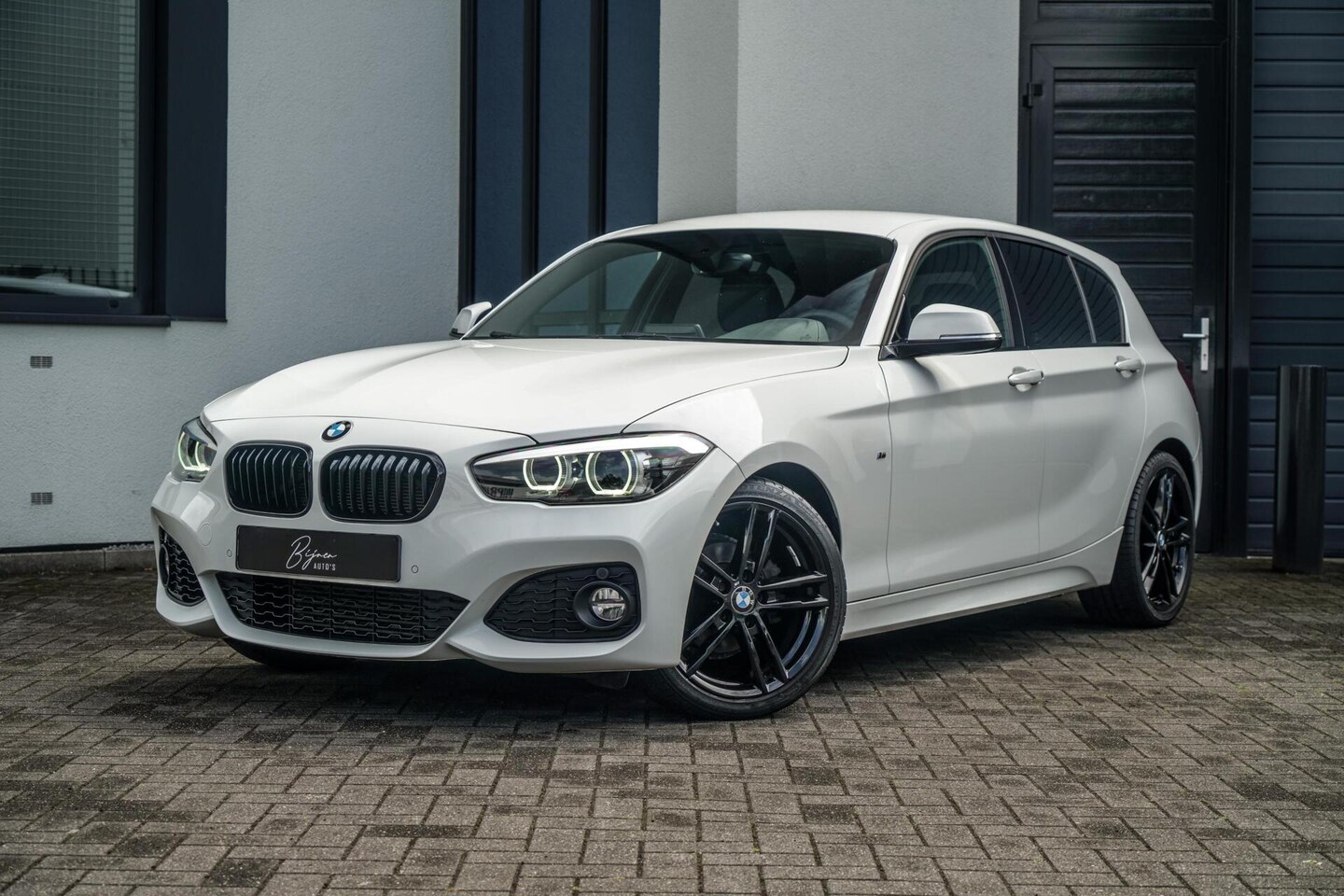 BMW 1-serie - 118i Edition M Sport LEER / NAVI - AutoWereld.nl