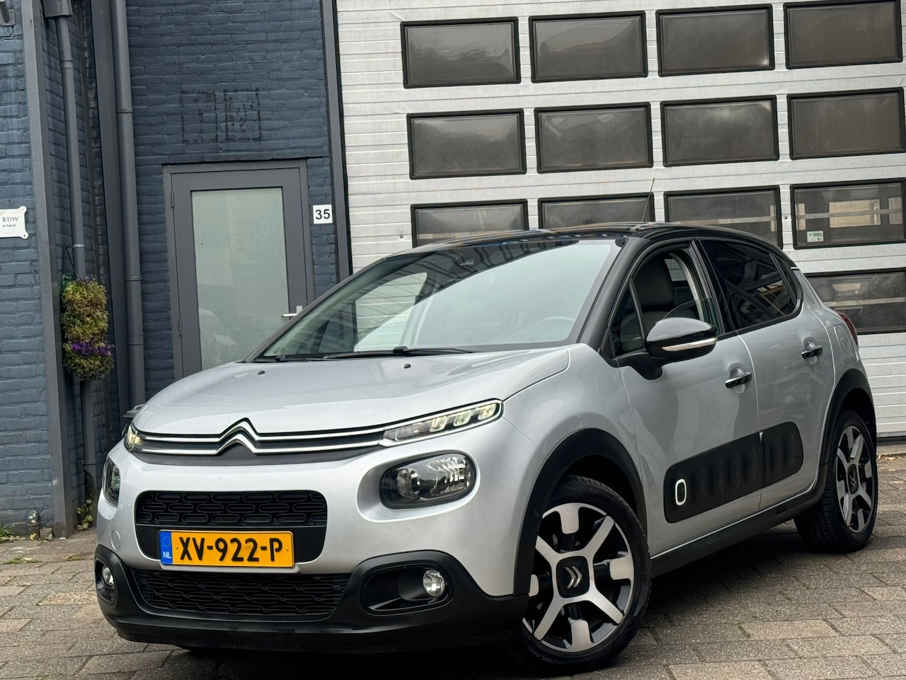 Citroën C3 - 1.2 PureTech ELLE | Clima | Cruise | Camera | Navi - AutoWereld.nl