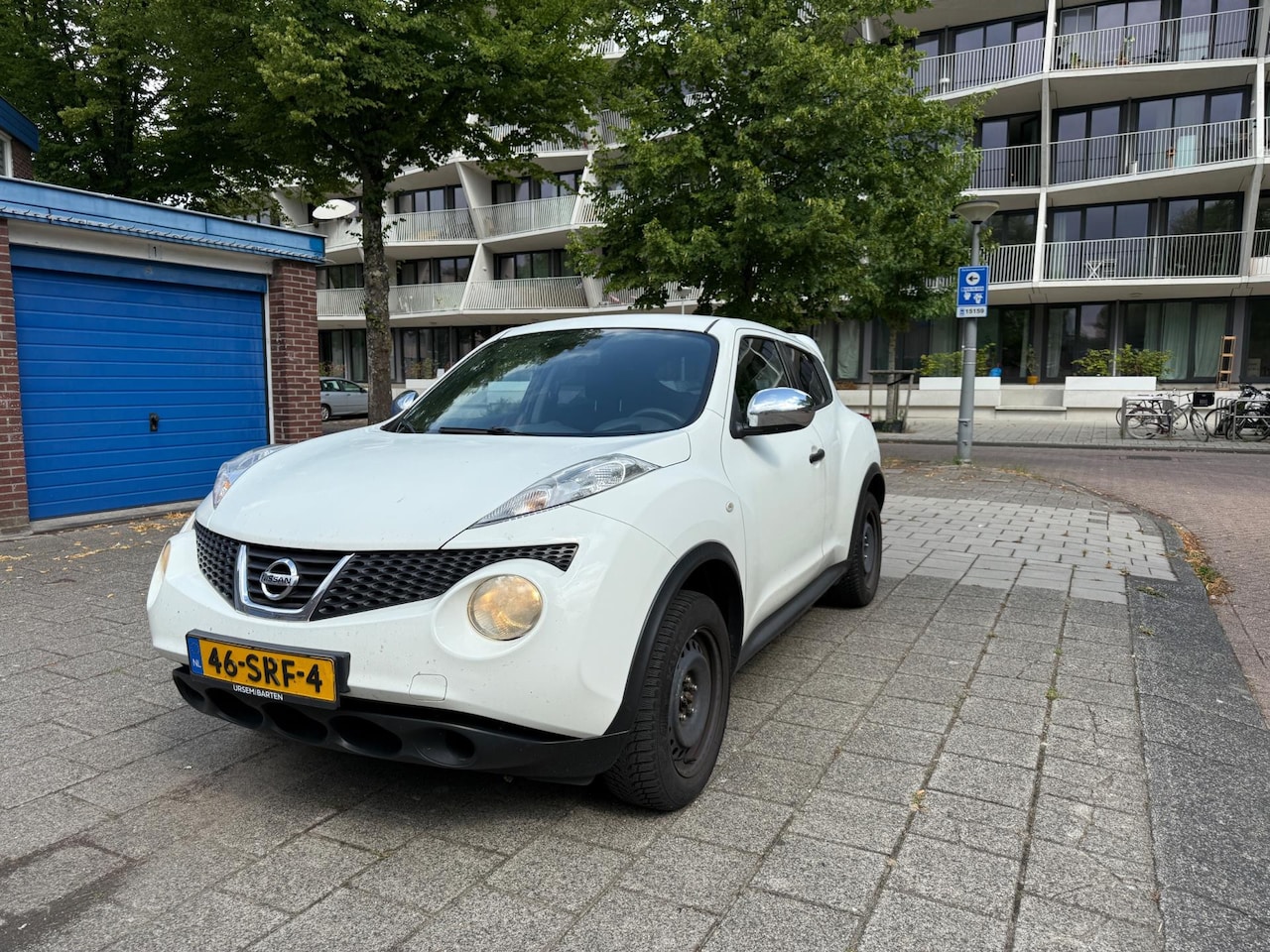 Nissan Juke - 1.6 Visia Eco Airco Snow White - AutoWereld.nl