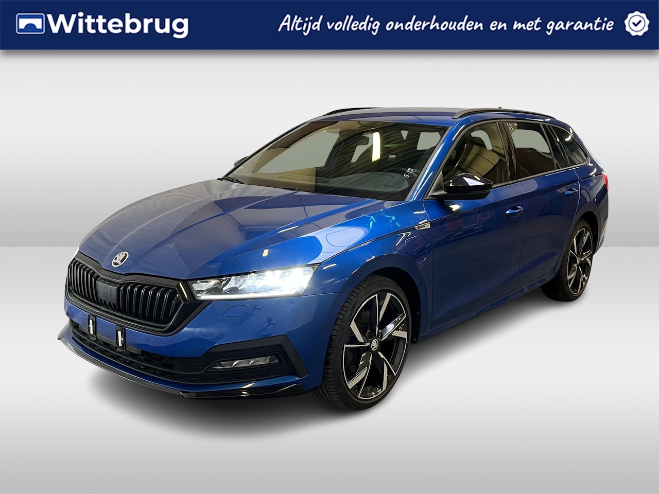 Skoda Octavia Combi - 1.4 TSI iV PHEV Sportline / AUTOMAAT/ KEYLESS/ LED/ CRUISE/ 18" LMV/ SMARTLINK/ PARK. SENS - AutoWereld.nl