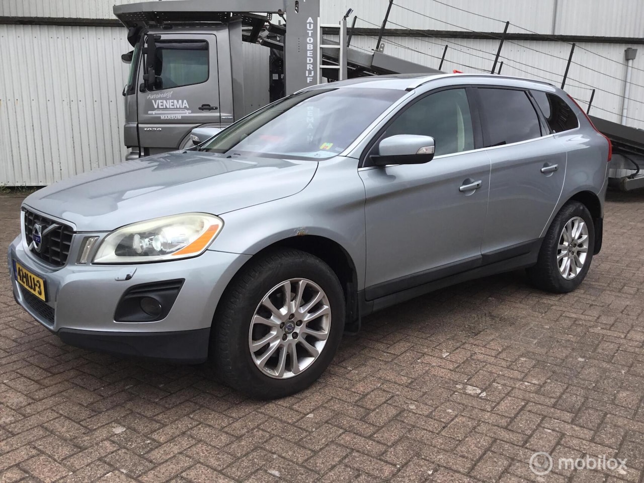 Volvo XC60 - 2.4 D5 AWD Summum 136kw /185pk trekhaak pano dak - AutoWereld.nl