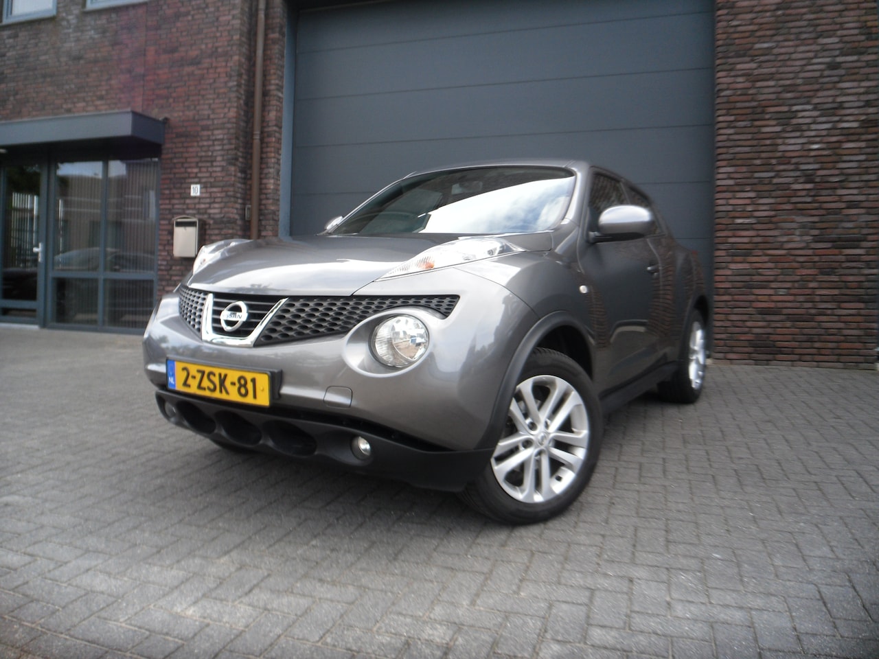 Nissan Juke - 1.6 Acenta 66d KM Cruise Climate - AutoWereld.nl