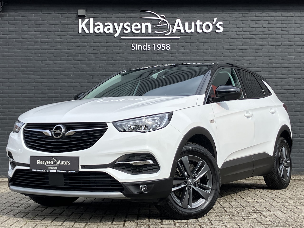 Opel Grandland X - 1.2 Turbo Business Elegance AUT. | apple carplay | camera | zwart dak | stoel-/stuurverwar - AutoWereld.nl
