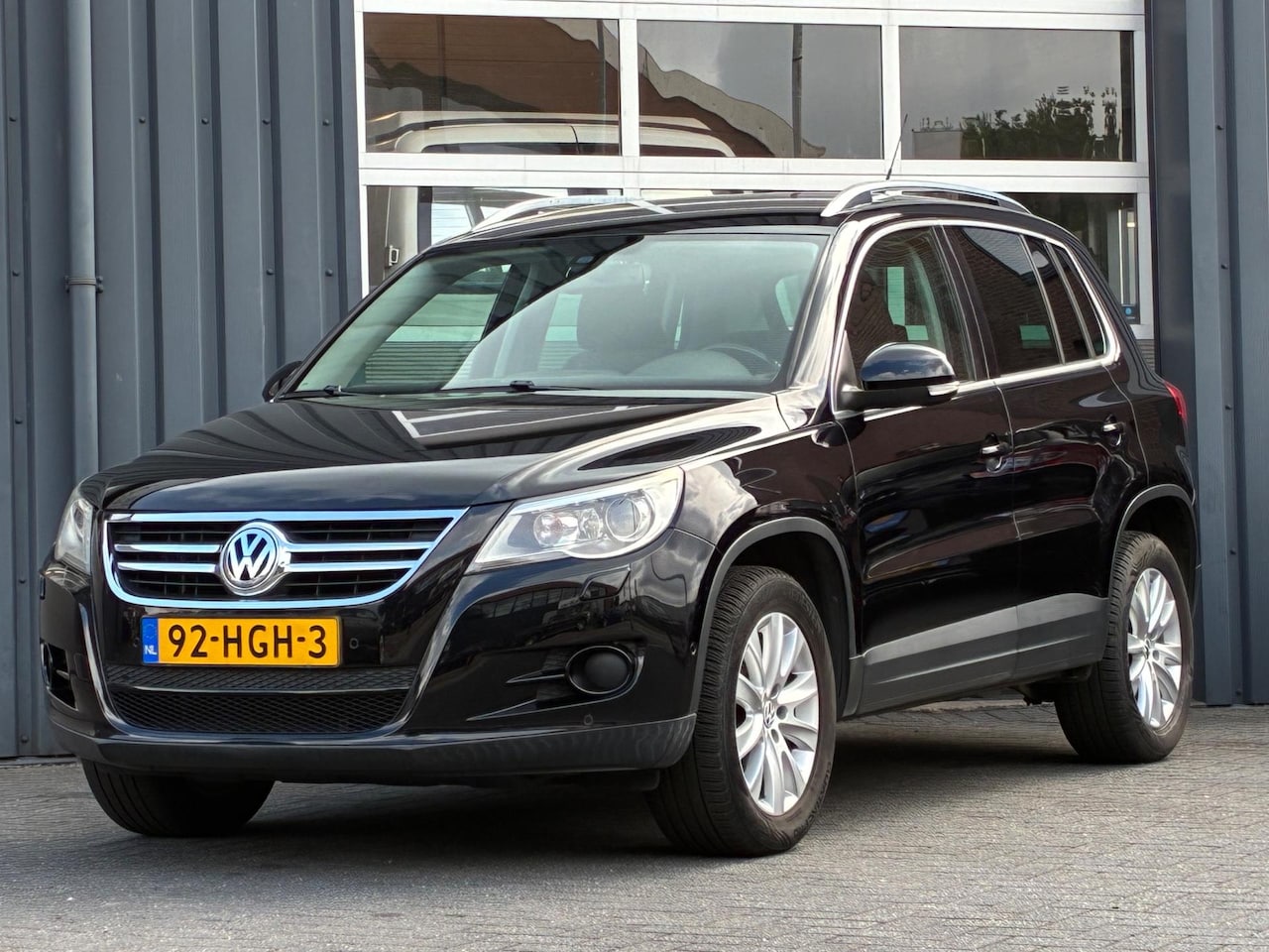 Volkswagen Tiguan - 1.4 TSI Sport&Style 4Motion Clima Cruise Pdc - AutoWereld.nl