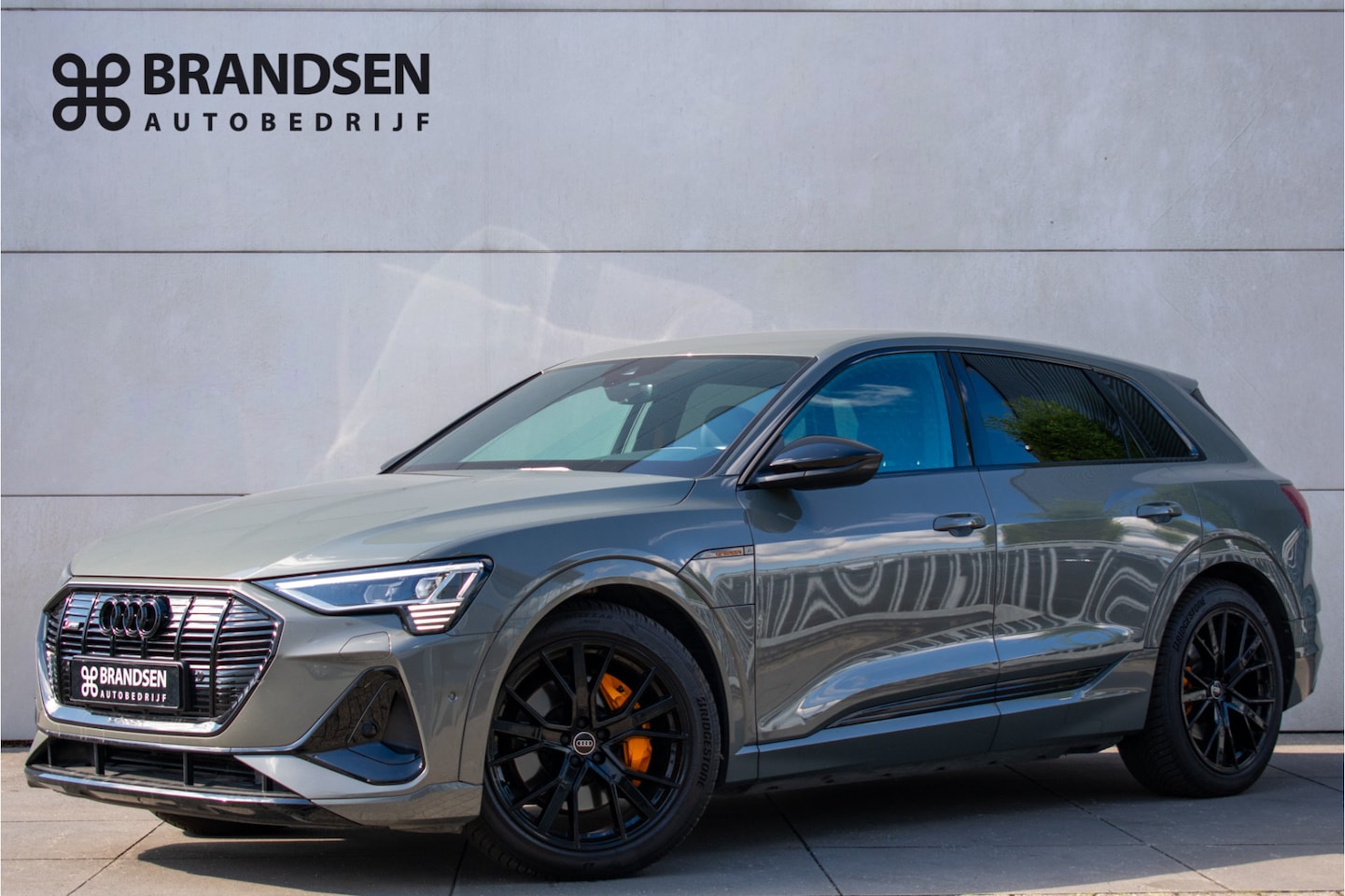 Audi e-tron Sportback - 55 quattro S edition 95 kWh -Luchtvering-21"-Keyless-Gele gordel/stiksels- - AutoWereld.nl