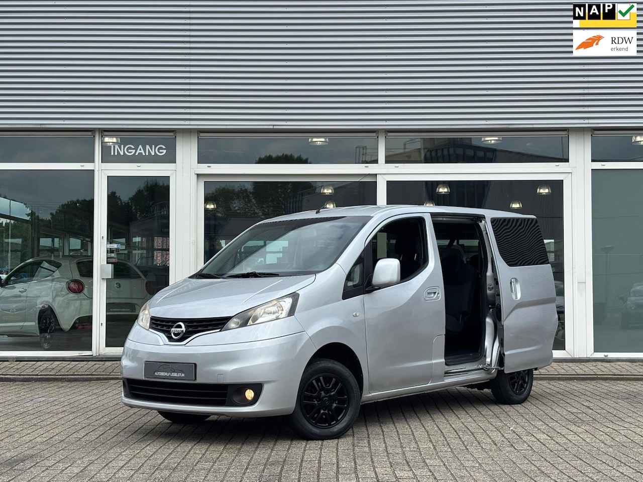 Nissan NV200 - 1.6 Evalia / 7 PERSOONS / Airco / Navi / Cruise Control. - AutoWereld.nl