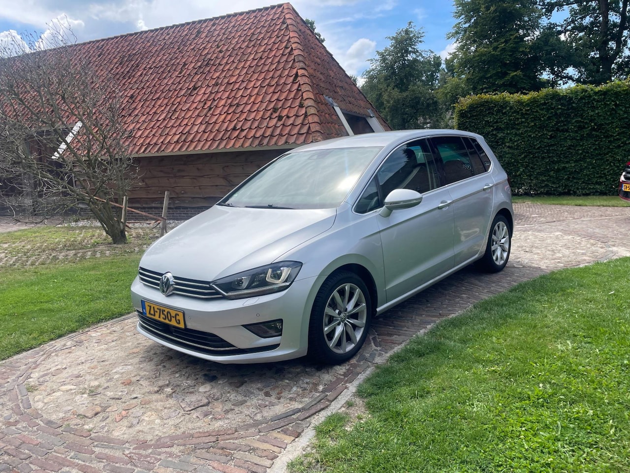 Volkswagen Golf Sportsvan - 1.4 TSI Highline-Navi-Stoelverw-Led-PDC-17"- - AutoWereld.nl