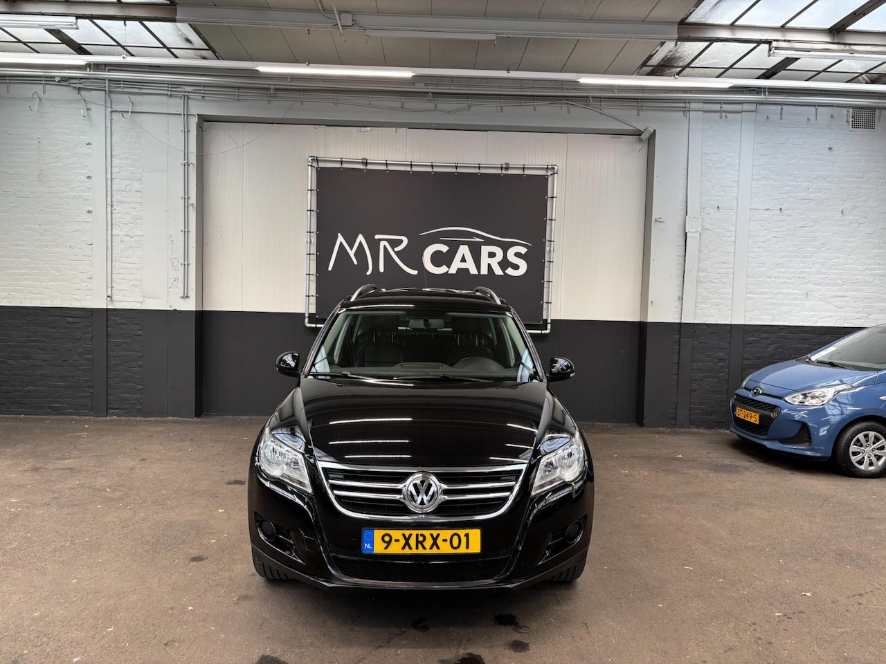 Volkswagen Tiguan - 1.4 TSI Trend&Fun 4Motion NAVI/LEDER/CRUISE CONTROL - AutoWereld.nl
