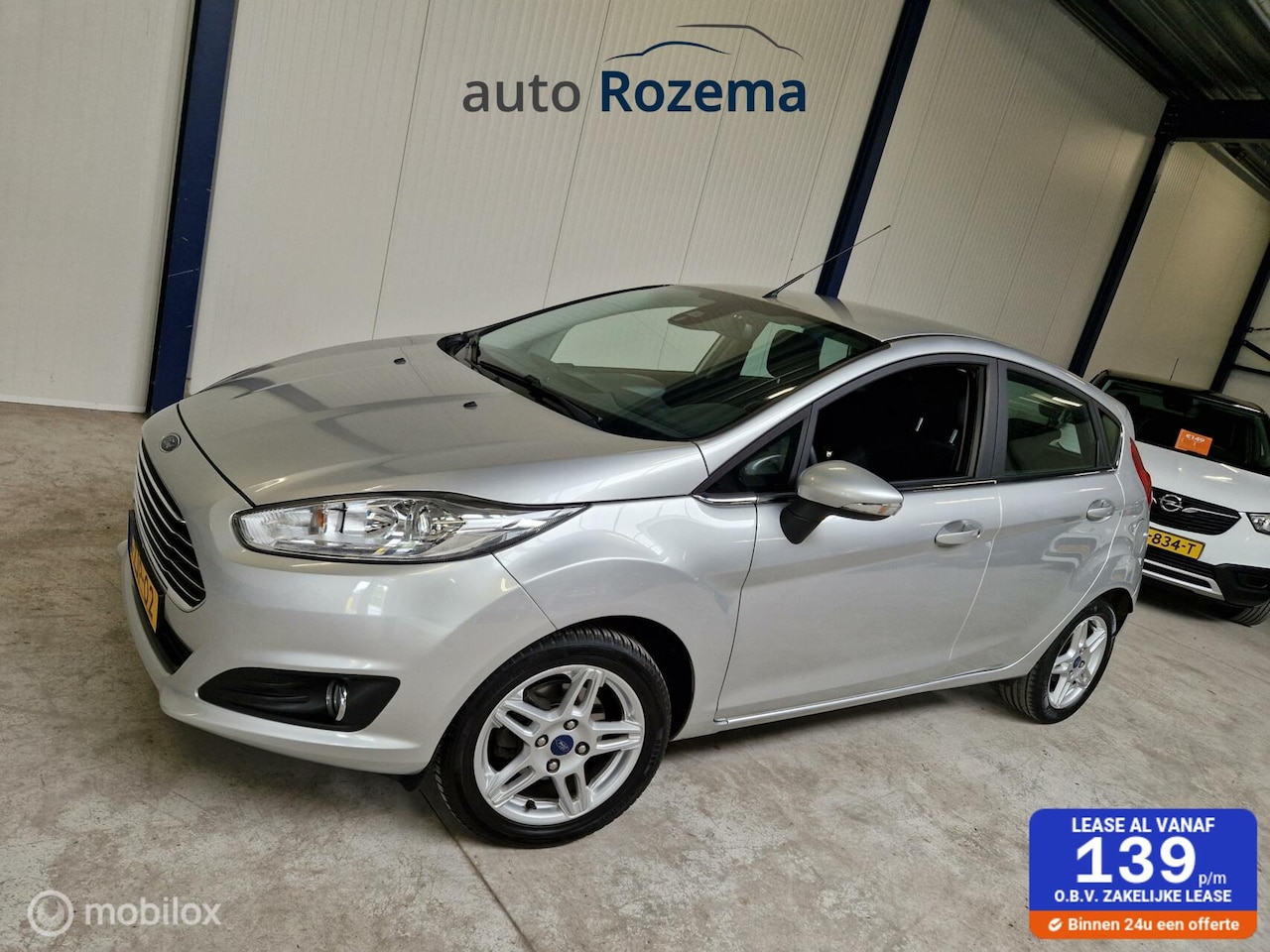 Ford Fiesta - 1.0 EcoBoost Titanium 100 pk Clima,Navi,Pdc v/a - AutoWereld.nl