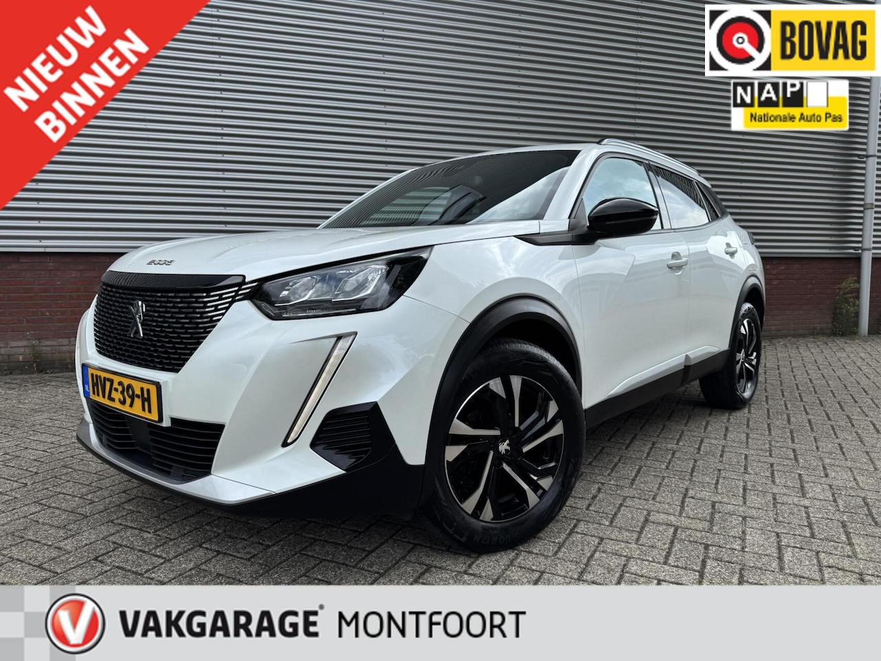 Peugeot 2008 - 1.2 PureTech Allure|3D Cockpit|Camera|Cruise|Carplay|Clima|Leder-Stof| - AutoWereld.nl