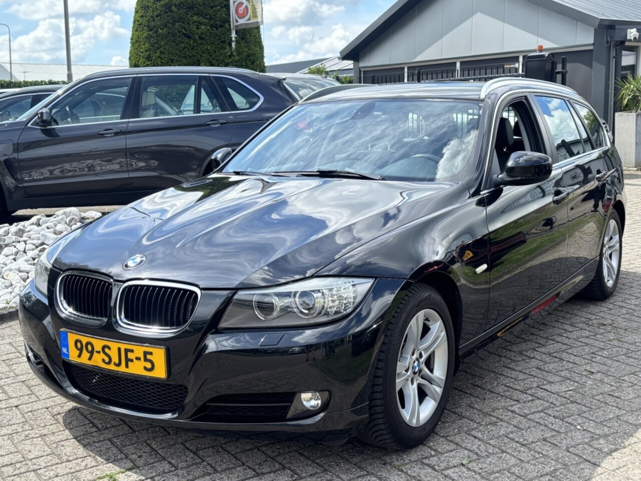 BMW 3-serie Touring - 318i Luxury Line 2011 Zwart Leer Xenon - AutoWereld.nl